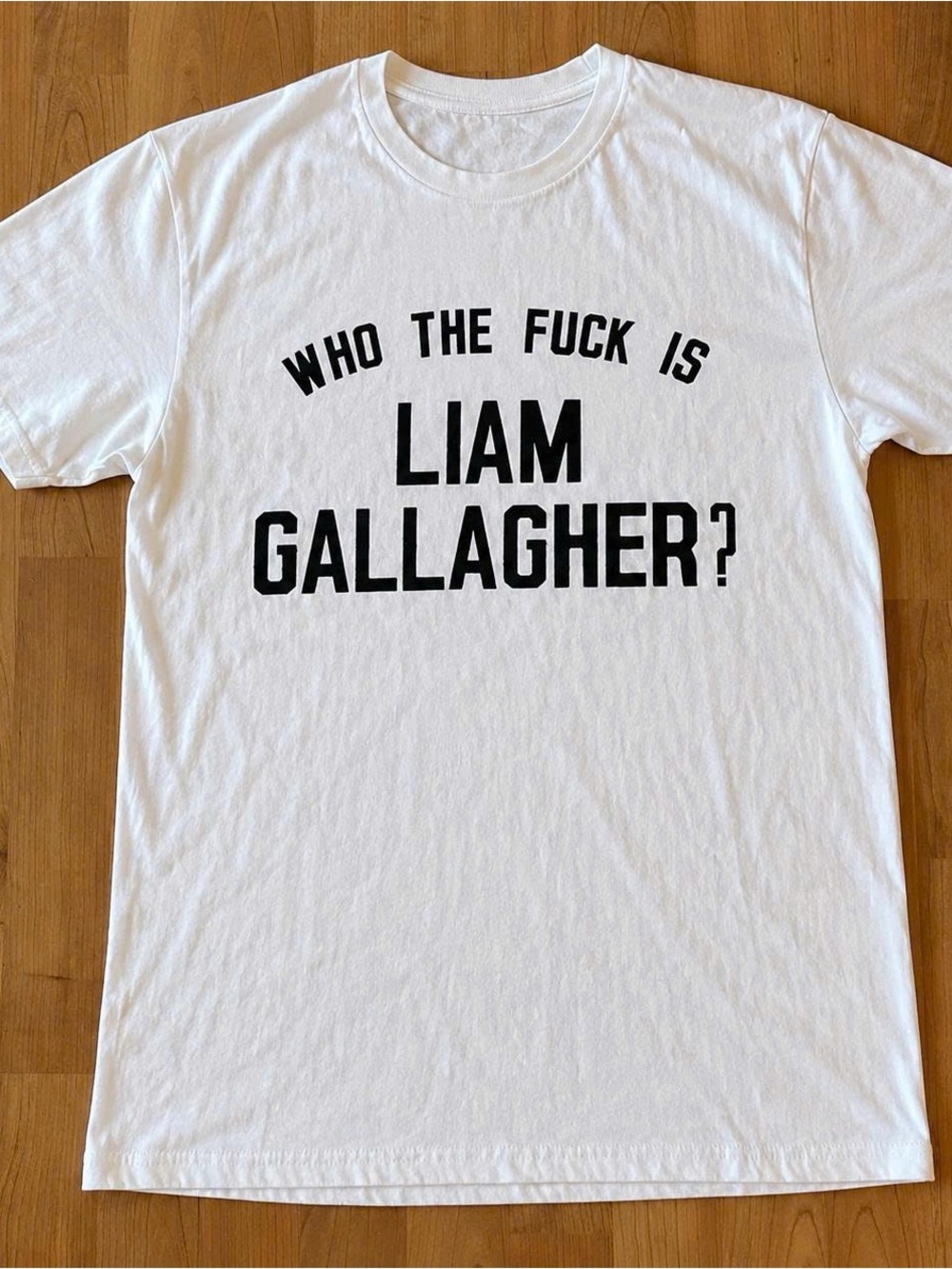 White Short-Sleeve Tee with Black Text Graphic